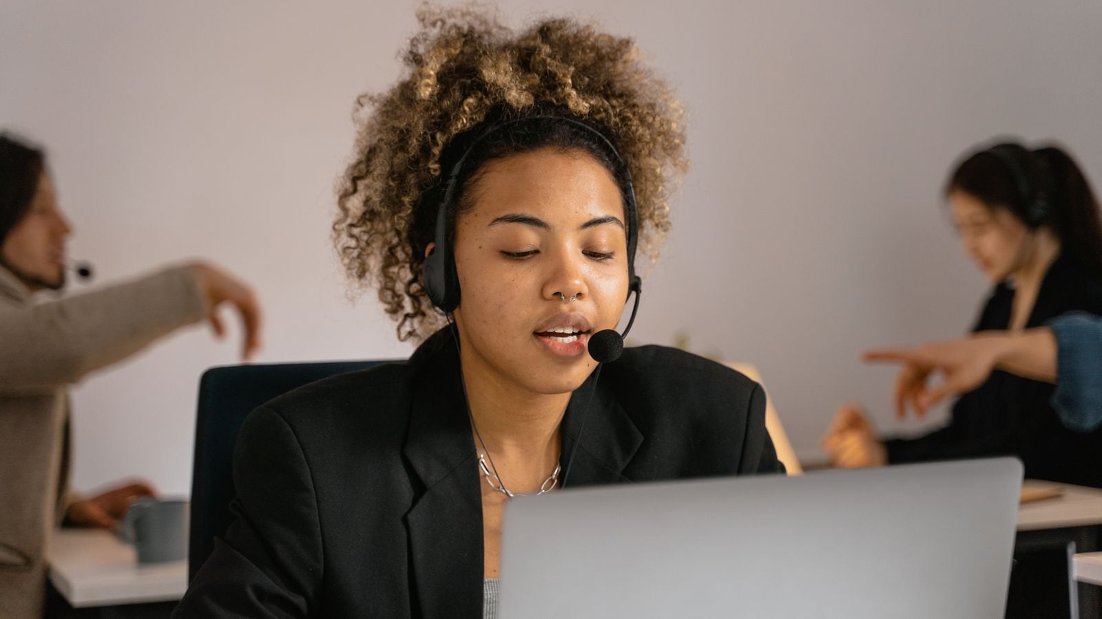Customer service specialist at a laptop